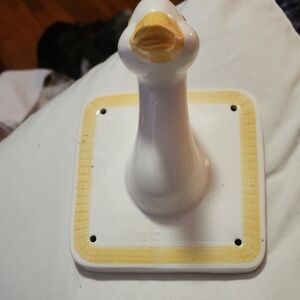 White Ceramic Duck Figurine with Yellow Accents